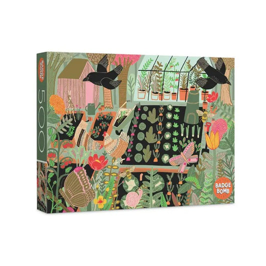 Five hundred piece puzzle depicting a garden scene with butterflies, chickens and crows
