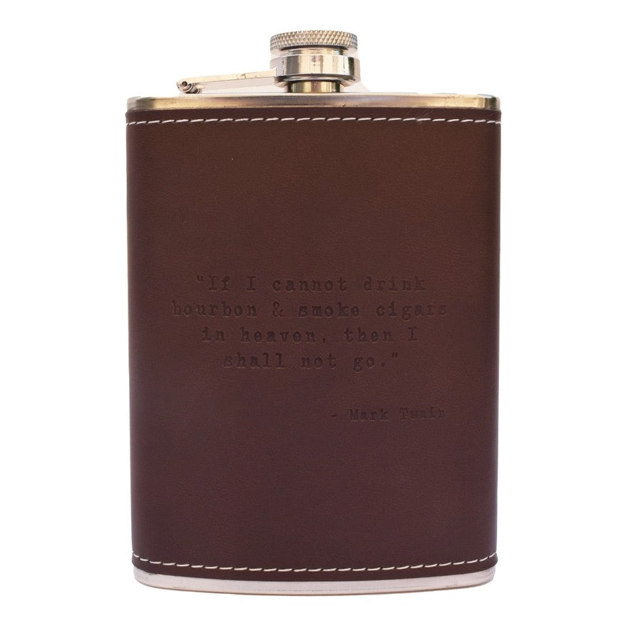 A metal and leather flask imprinted with the Mark Twain quote: "If I cannot drink bourbon & smoke cigars in heaven, then I shall not go."