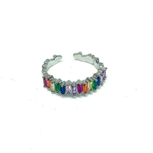 An adjustable silver ring covered in small colorful gems to resemble a circular rainbow.