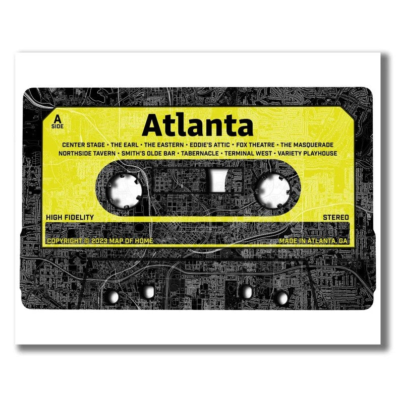 Print of a map of Atlanta imposed on a cassette tape in black, white and bright yellow 