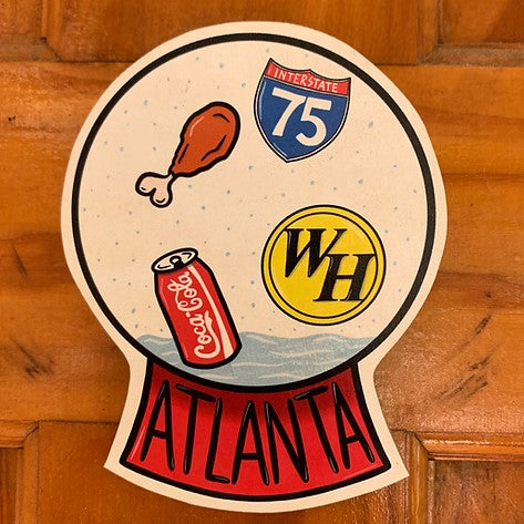 Atlanta snowglobe wood wall art with the waffle house and coca cola logo inside
