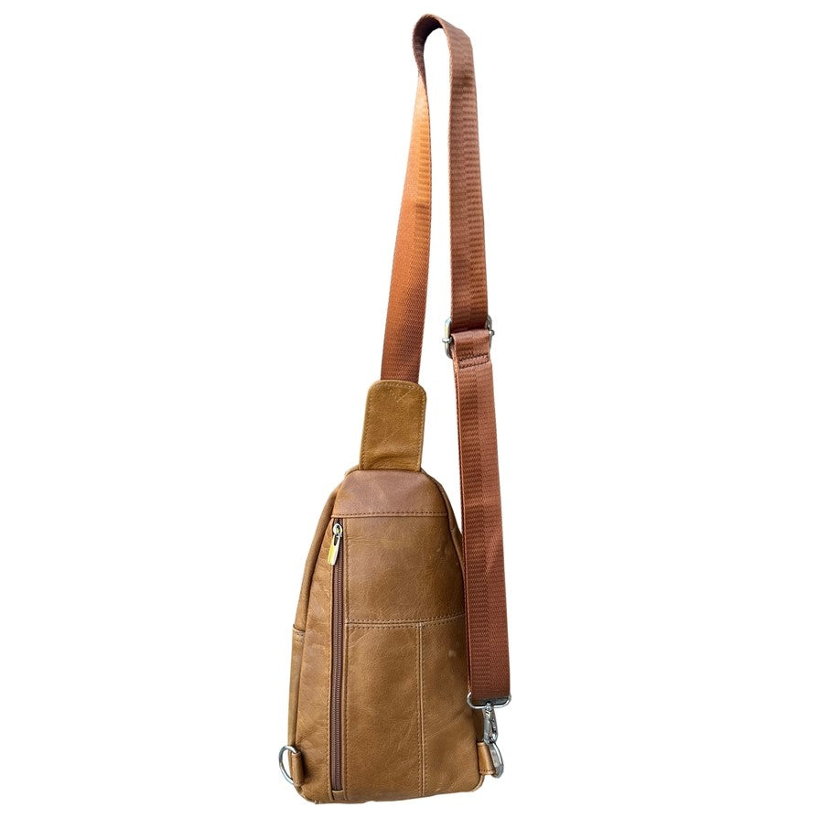 Back of a small tan leather crossbody bag featuring one zipper pocket on the backside