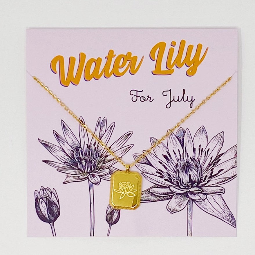 Gold plated necklace with a pendant engraved with water lilies for July birthdays