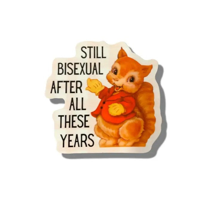 Sticker of a smiling squirrel in a red jacket next to text that reads "Still bisexual after all these years"