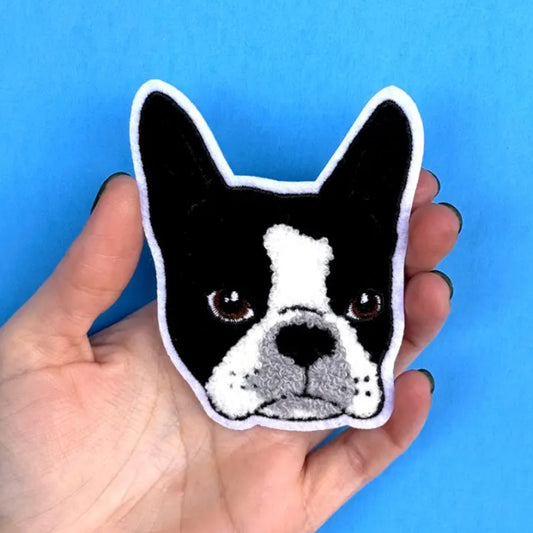 Iron on fabric patch in the shape of a black and white Boston Terrier's face