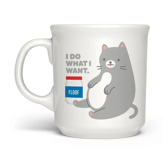 White mug with a cartoon gray cat next to a jar of marshmallow fluff and the words "I do what I want"