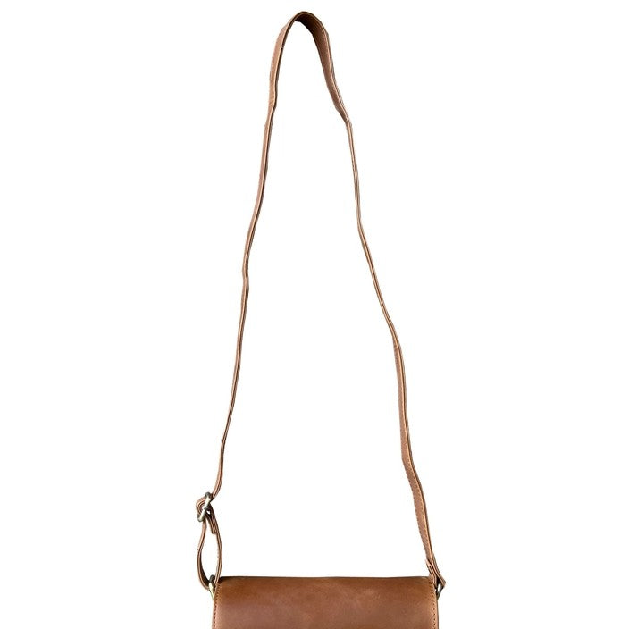 Light brown leather crossbody purse with an adjustable strap