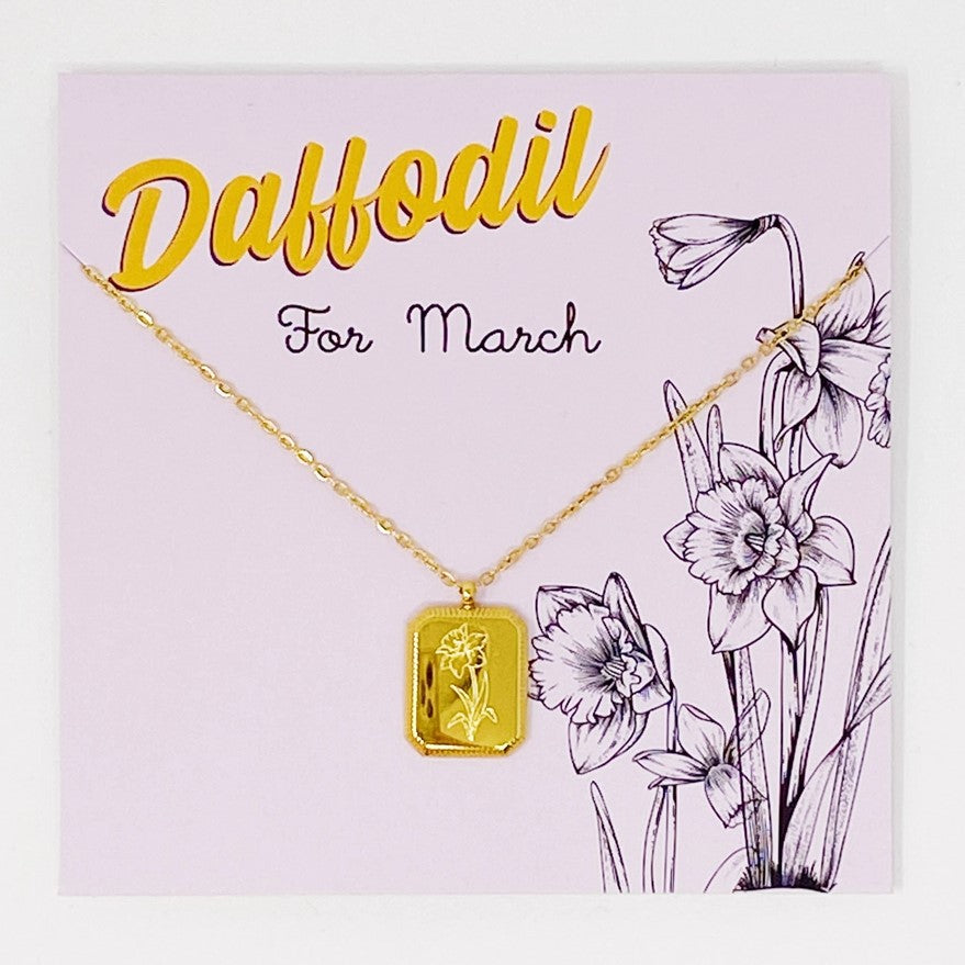 Gold plated necklace with a pendant engraved with daffodils for March birthdays