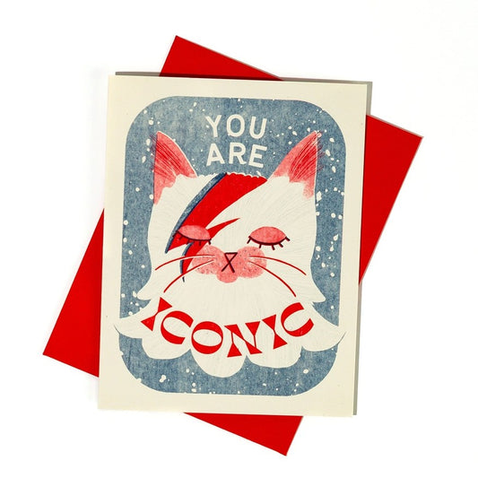Greeting card with an illustration of a cat in David Bowie makeup and text that reads "You are iconic"