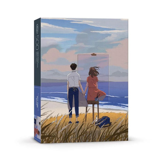 man holding hands with a painting in front of ocean puzzle