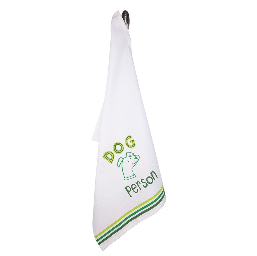 White towel with a green picture of a smiling cartoon dog and the words "Dog Person"