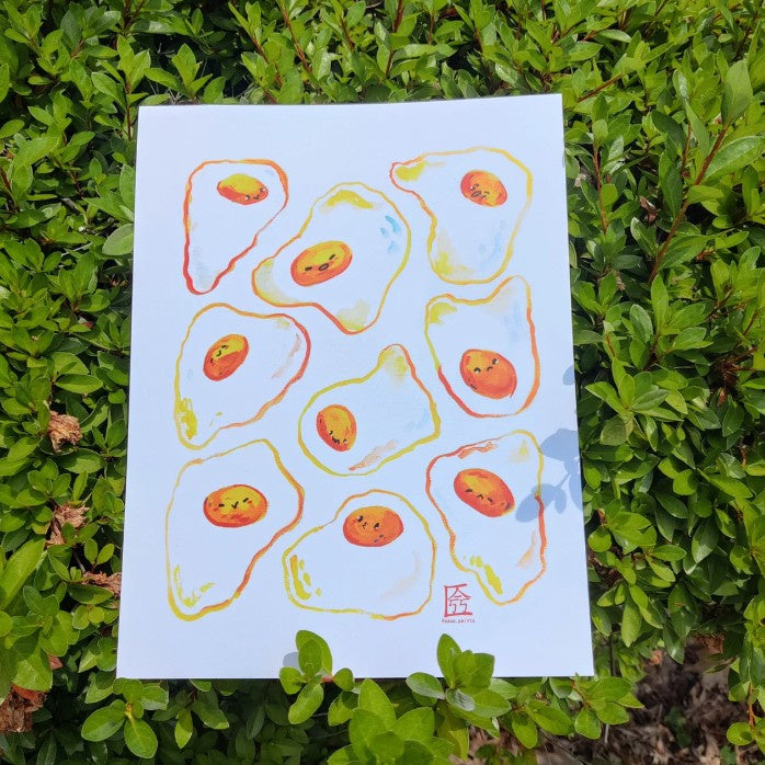 Art print of cartoon runny eggs with cute and expressive faces