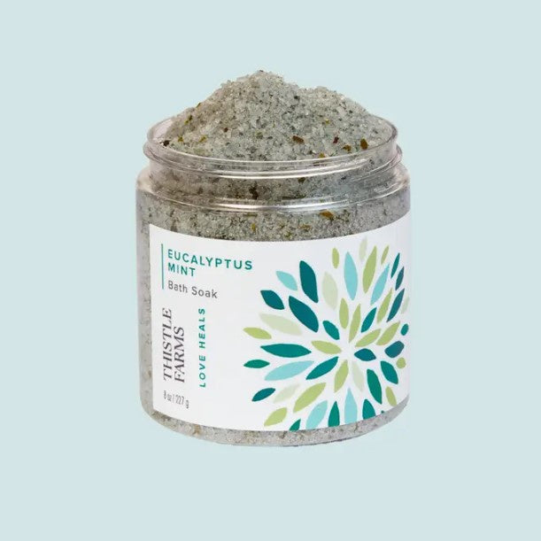 An eight ounce jar of eucalyptus mint scented bath soak.