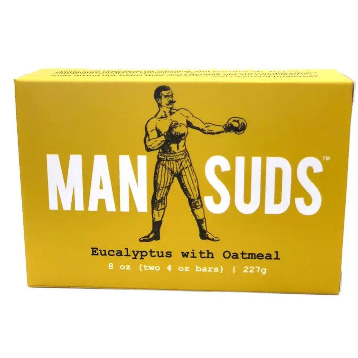 A bar of soap in the scent eucalyptus with oatmeal featuring an illustration of a vintage boxer on the front of the box.