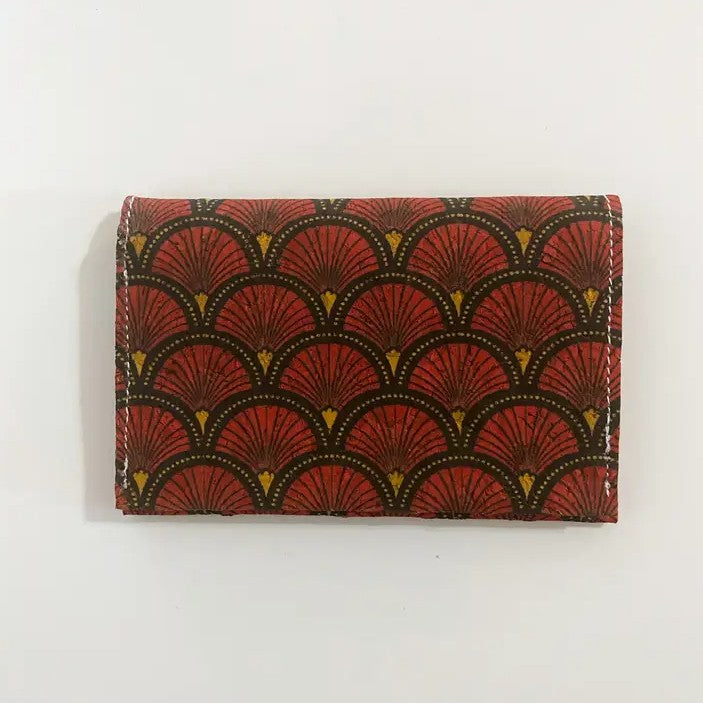 Small cork wallet with a red, black and yellow fan pattern