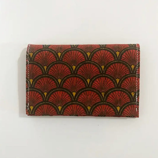 Small cork wallet with a red, black and yellow fan pattern