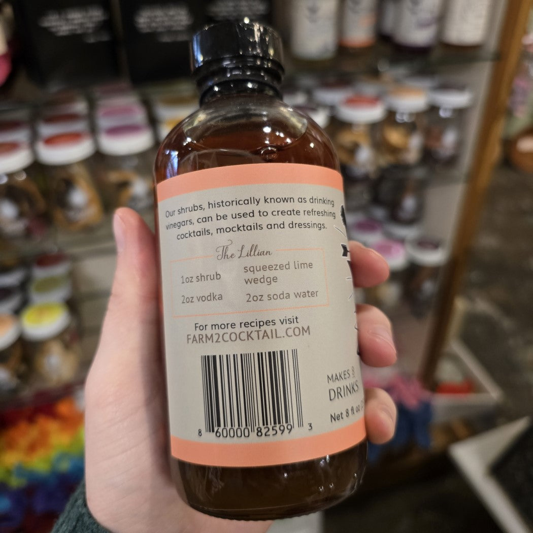 An eight fluid ounce bottle of peach lavender drink mixer.