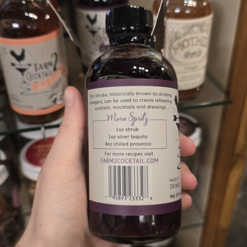 An eight ounce bottle of blackberry rosemary drink mixer.