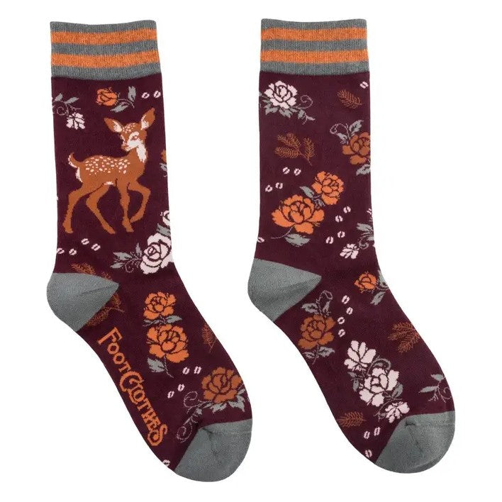 Maroon socks with a rose and deer pattern
