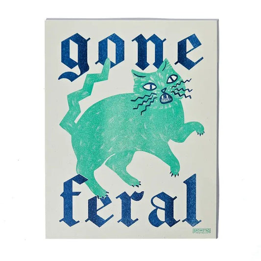 Art print featuring a green hissing cat and the words "Gone Feral" in blue