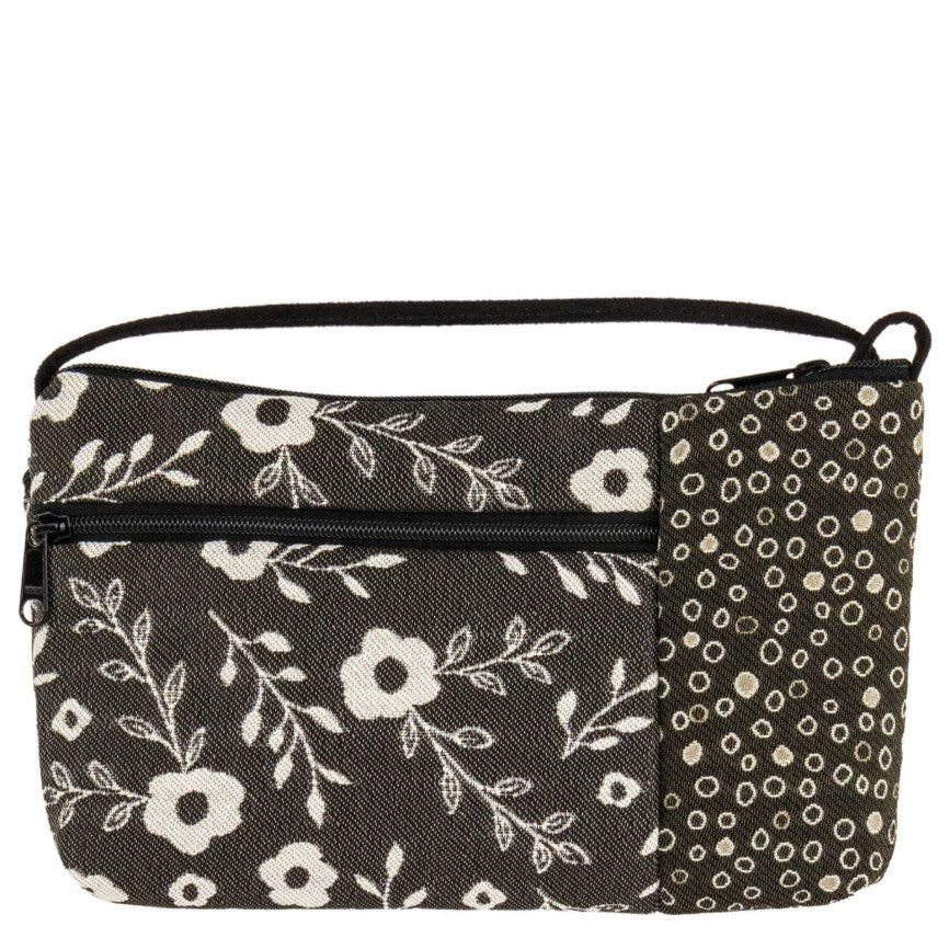 A gray and white handbag with a mismatched floral and dot pattern. It has a zipper pocket in the front and a zipper closure at the top.