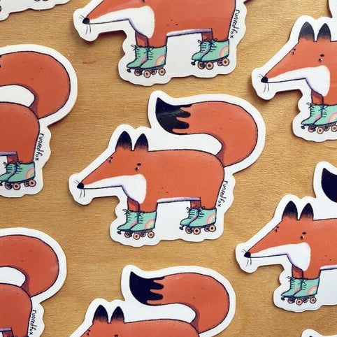 Multiple of the same sticker featuring a fox wearing skates