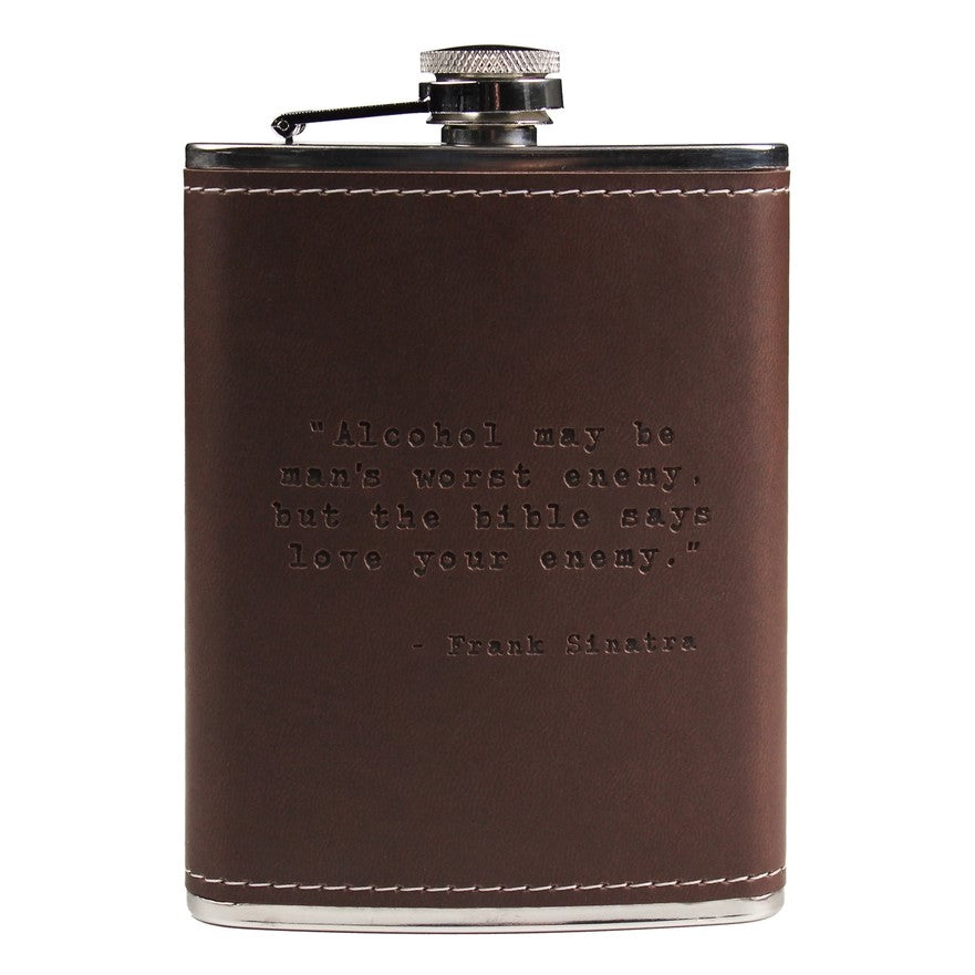 A metal and leather flask imprinted with the Frank Sinatra quote: "Alcohol may be man's worst enemy, but the bible says love your enemy."