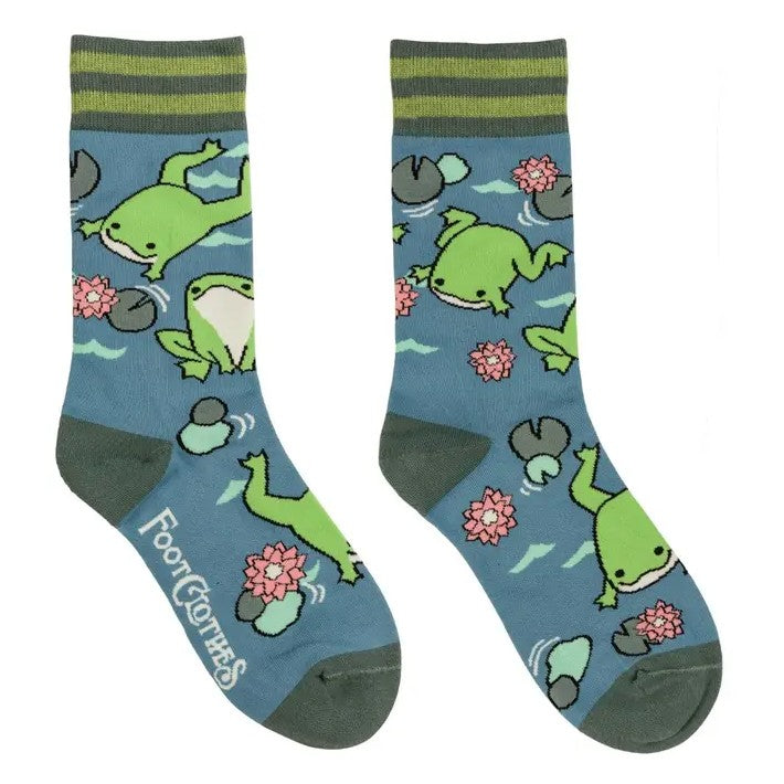Blue socks with a cartoon frog and lily pad pattern 