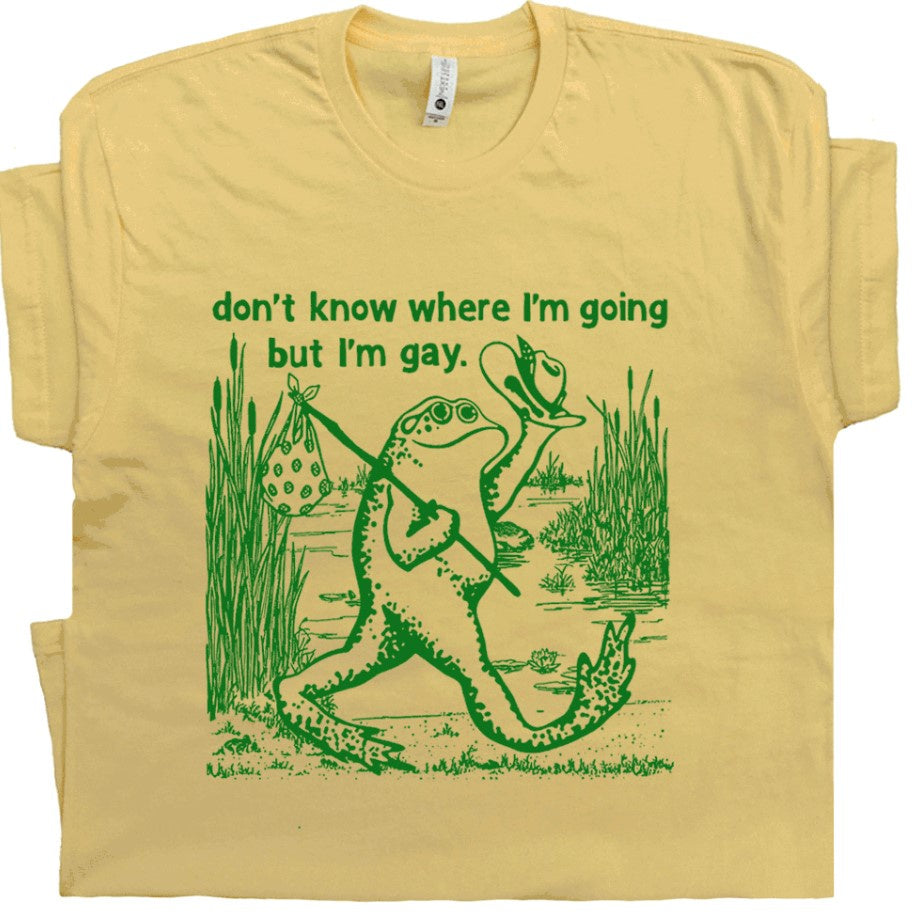 Hobo frog with a bag on a stick and holding up a hat t-shirt