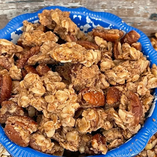 Blue bowl filled with pecan granola