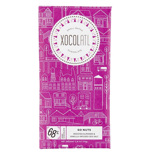 xocolatl chocolate bar in pink packaging with white houses