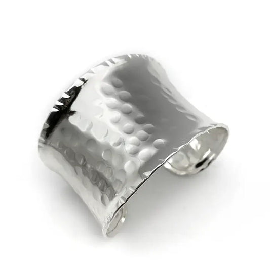 A wide hammered silver cuff bracelet 