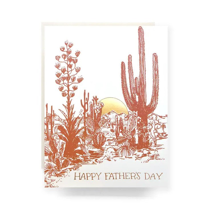 Father's Day card featuring an orange and white inked illustration of a desert landscape and the caption "Happy Father's Day"