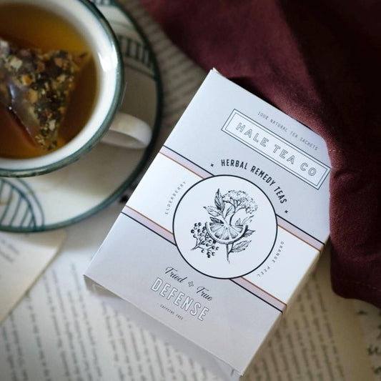 Box of Hale Tea Defense Tea bags with an elegant floral design on the front