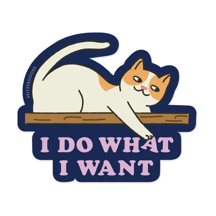 A sticker depicting a calico cat mischievously pawing at the text "I do what I want" over a navy background