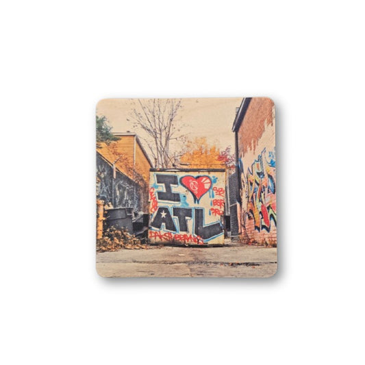Square coaster featuring a photographed image of graffiti that reads "I love ATL"