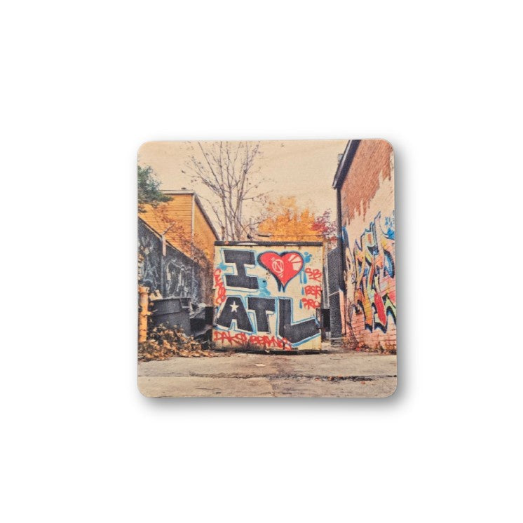 Square coaster featuring a photographed image of graffiti that reads "I love ATL"