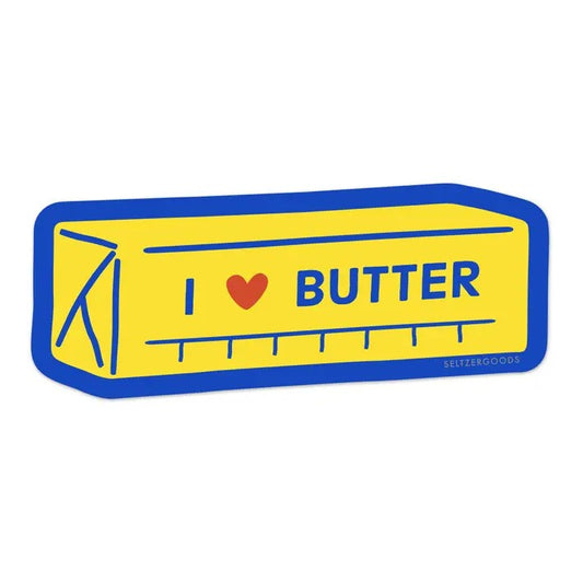 A sticker depicting a bright yellow stick of butter with text "I love butter" on a bright blue background