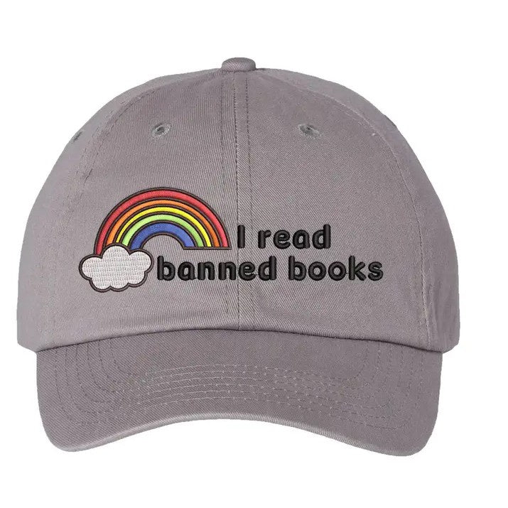 Gray cap with embroidered rainbow and text that reads "I read banned books"