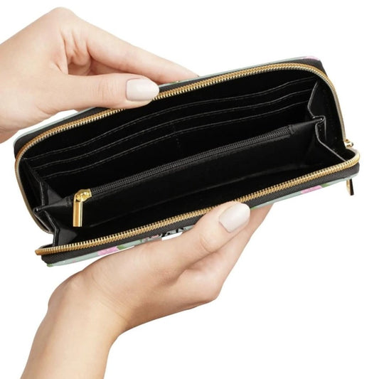 Black interior compartments of a zippered wallet 