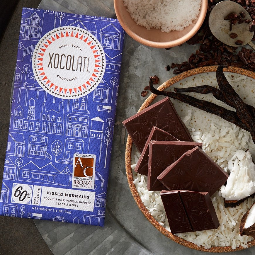 A 60% dark chocolate bar with coconut milk, vanilla-infused sea salt and nibs.