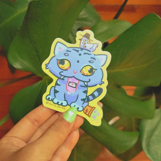 Sticker of a blue cartoon tiger with a three eyed bird sitting on its head