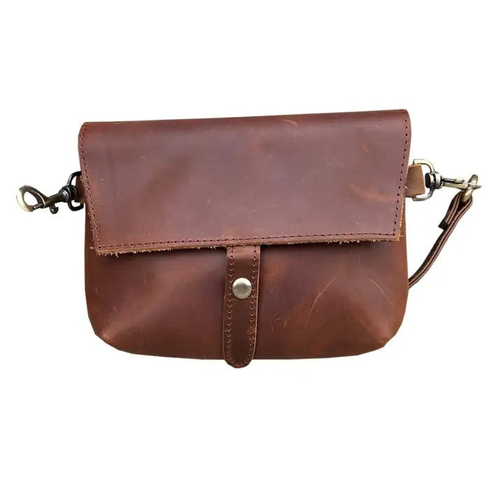 Dark brown leather bag with snap closure
