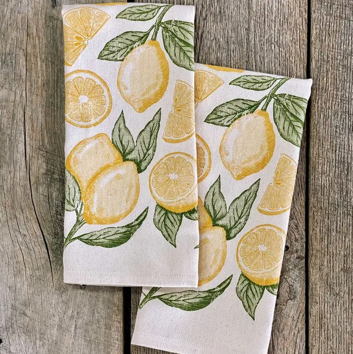 Kitchen towels with a yellow and green lemon pattern