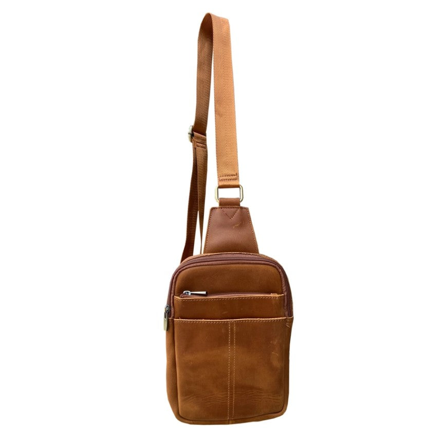 Light brown leather sling bag with an adjustable strap