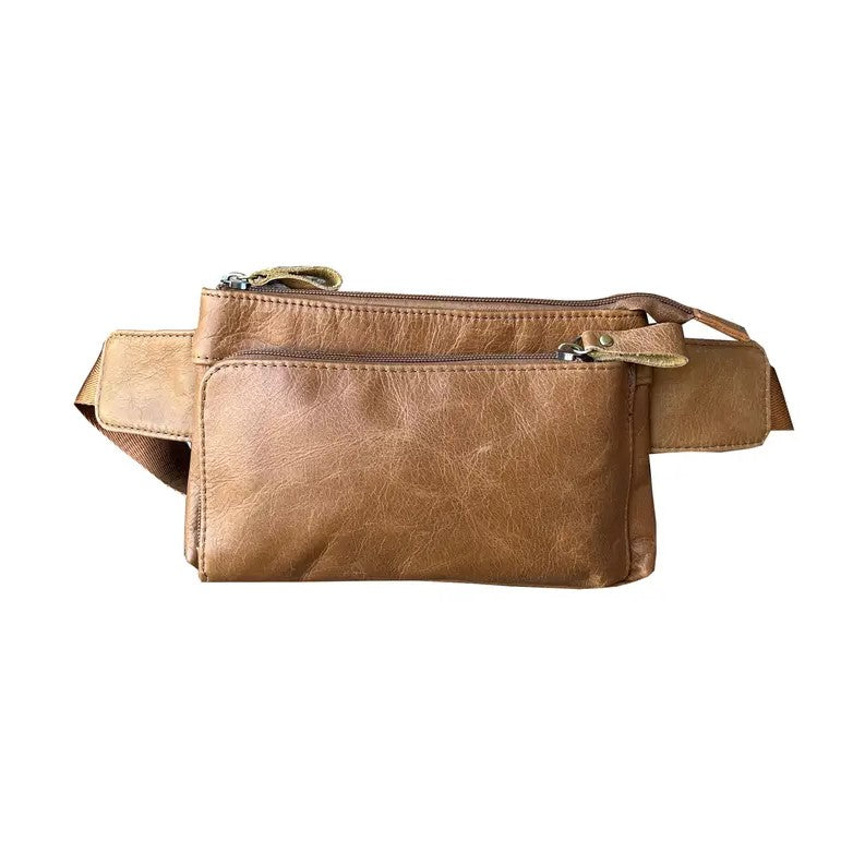 A tan leather fanny pack with two zippered pockets.