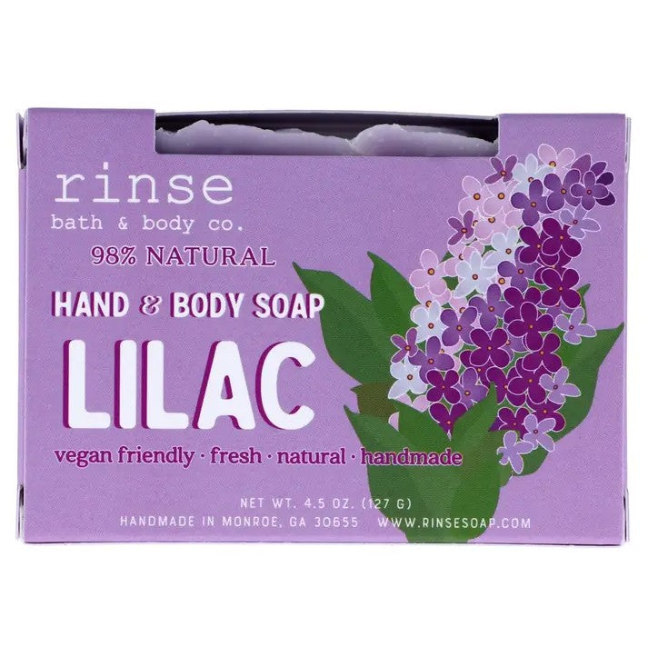 Bar of lilac scented soap in purple floral packaging