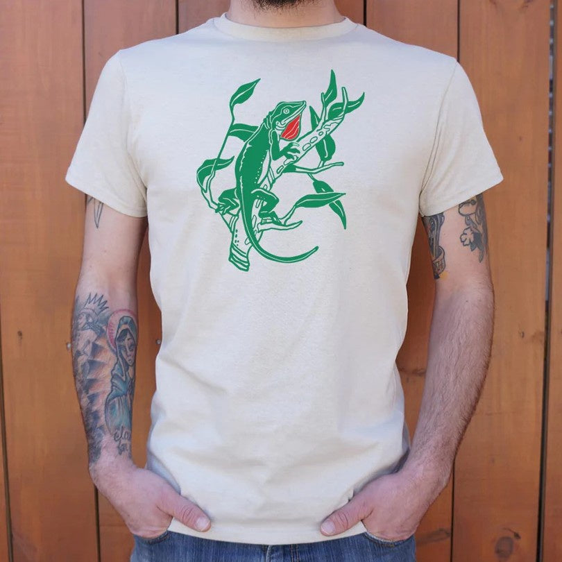 White t-shirt with a green graphic of a lizard with a red neck frill