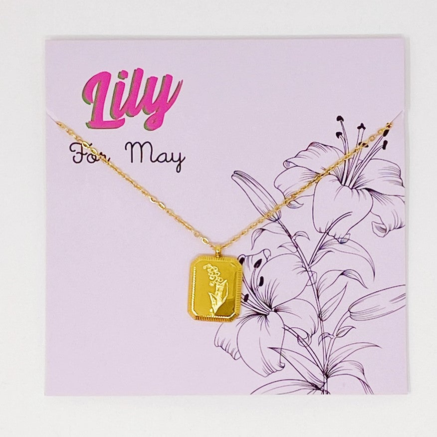 Gold plated necklace with a pendant engraved with lilies for May birthdays