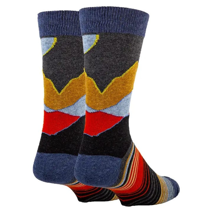 Calf high socks depicting an abstract horizon and skyline in the colors gray, gold, red, black and blue.